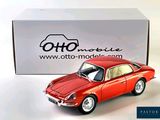 a toy car that is sitting in front of a box