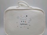 a white bag that has a star design on it