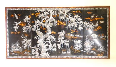 a picture of a black and white screen with birds and flowers