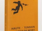 a yellow book with a picture of a man running on it
