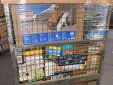 a cart that has many items on it in a warehouse