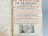 an open book with a picture of a man and a woman on it