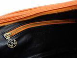 a black and orange purse with a zipper on it