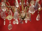a chandelier with a bunch of crystal drops hanging from it
