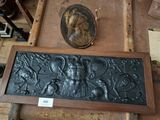 a plaque with a picture of a man and a woman on it