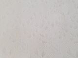 a close up picture of a toilet paper roll on the floor