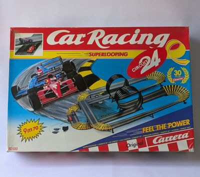 a box with a toy racing car on it