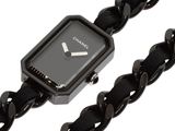 nixon women ' s black stainless steel watch with a black leather strap
