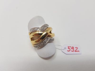 Large bague deux ors 750e formant rubans croisés, certains s…