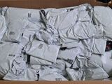 a cardboard box filled with bags and bags of food