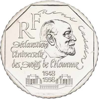 une image représentant une pièce de monnaie sur laquelle figure le portrait d'un homme