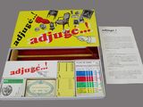 a box with a card game inside of it on a table
