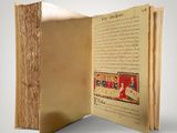 an open book with a picture of a man and a woman on it