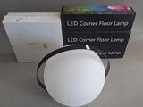 a light that is sitting on a table next to a box