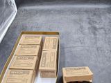 four boxes of cigarettes in the back of a truck