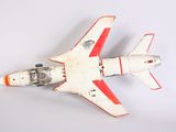 a toy airplane that is sitting on a white surface
