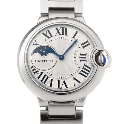 a close up of a wrist watch with roman numerals on the dial