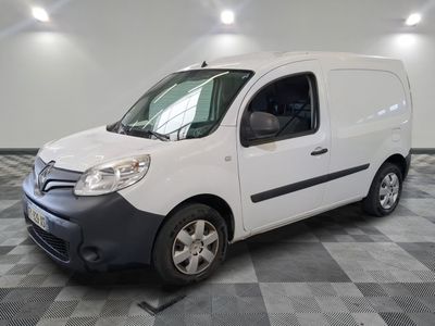 a picture of a white van parked on a checkered floor