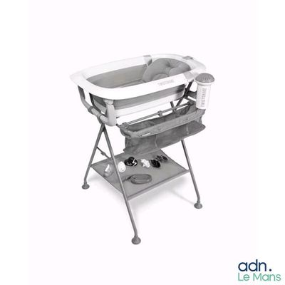 an image of a baby changing table with a baby in it