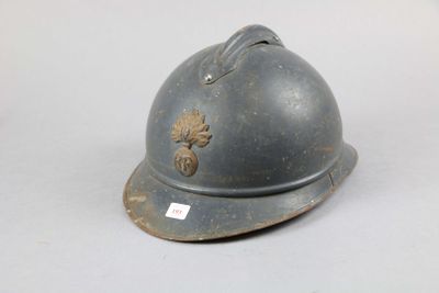 a helmet that is sitting on a white surface