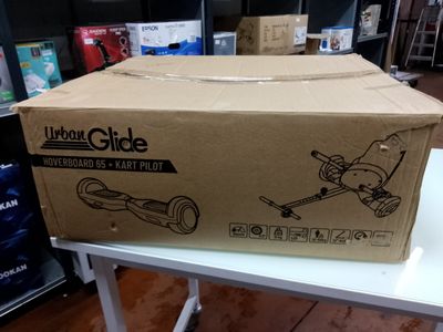 the box is sitting on the table with the tools in it