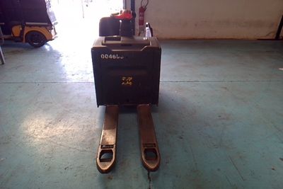 a forklift that is sitting in a garage