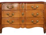 an image of a wooden dresser with brass handles and drawers