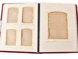 an open book with a picture of a window inside of it
