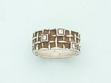 an image of a silver ring with squares and squares on it