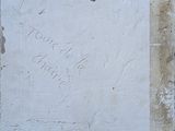 a sign on the side of a building that says you ' re here