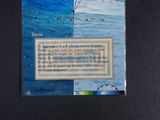 a card with a picture of a person parasailing in the water