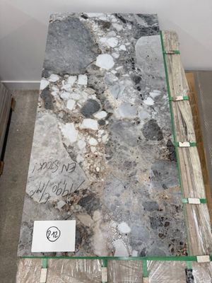 a table that has a lot of marble on top of it