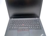 the laptop is open and ready to be used on the desk