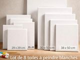 quatre toiles blanches de tailles et de formes différentes, montées sur un support en bois