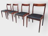 set of four danish teak dining chairs with black leather seats