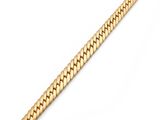 a close up of a gold chain on a white background