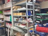 a room filled with lots of boxes and shelves