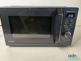 an image of a microwave oven sitting on a counter