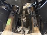a close up view of a car ' s front suspensions