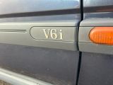 a close up of a car ' s door handle with the number 811 on it