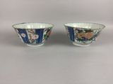 pair of blue and white bowls with floral designs