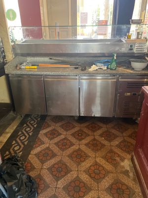a kitchen with a lot of counter space in it