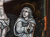 an image of a painting of jesus on the cross and a man on the cross