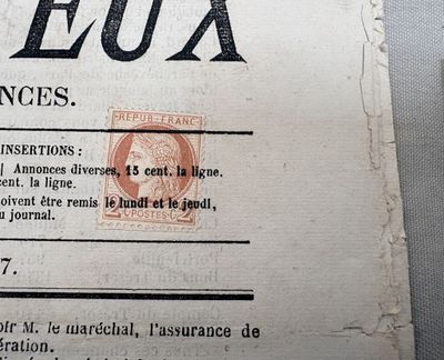 a close up of a paper with a stamp on it