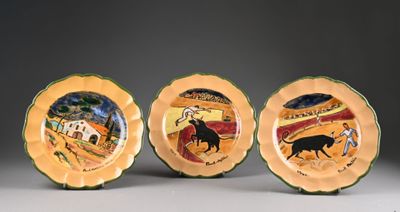 three plates with a picture of a horse and a man on a horse