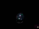 an image of a black oplite in the dark