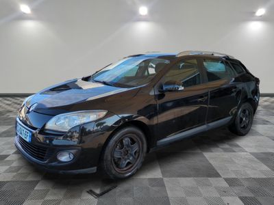 a picture of a black car parked in a garage