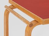 an image of a red table with a wooden frame