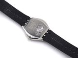 a close up of a wrist watch on a white surface
