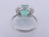 an emerald and diamond ring